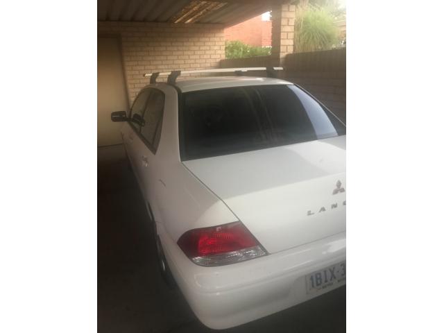 2003 Mitsubish lancer whi